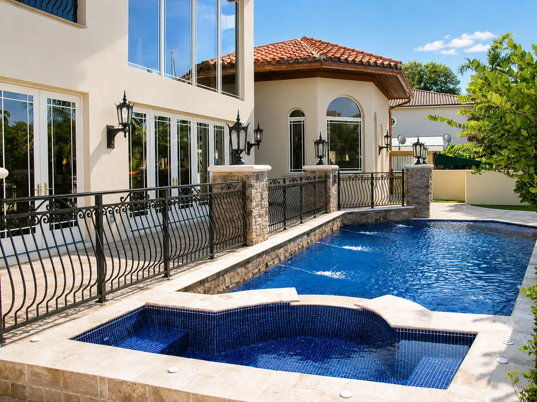 Pool and spa with tile detailing