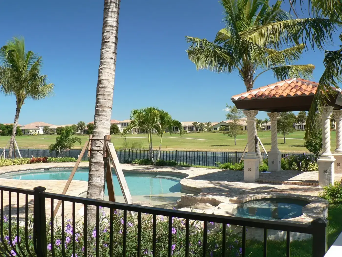 Pool and covered gazebo overlooking the golf course